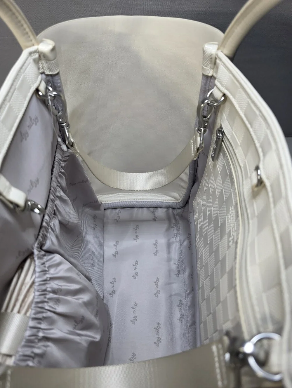 Itzy Ritzy Boss Tote Diaper Bag Limited-edition checkered pattern.